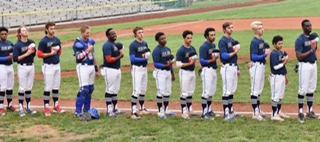 Blue Jays line up in their special uniforms for USO night