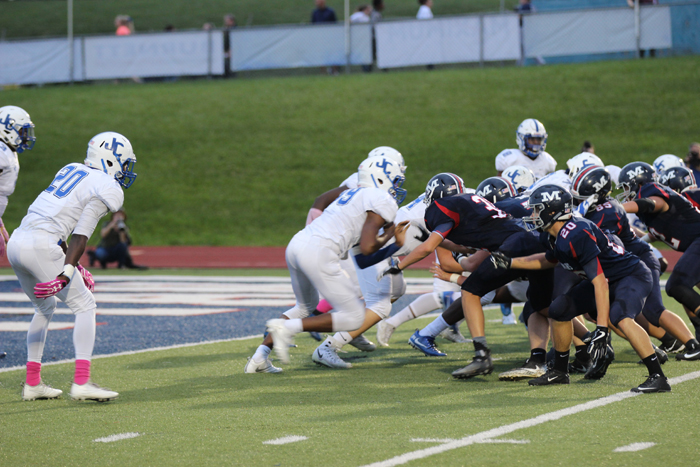 Blue Jays defense clashing against the Manhattan Indians during the silver trophy game. 