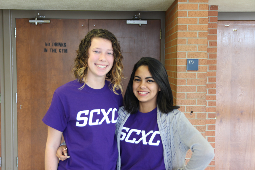 Kailey Koomen and Michelle Sanchez sporting their Southwestern shirts after their signing. 