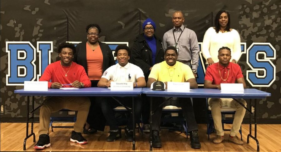 On+the+national+signing+day+seniors+Kenson+Henderson%2C+Davante+King%2C+Xavier+Cason%2C+and+Lucio+Norris+signed+to+play+collegiate+football.+