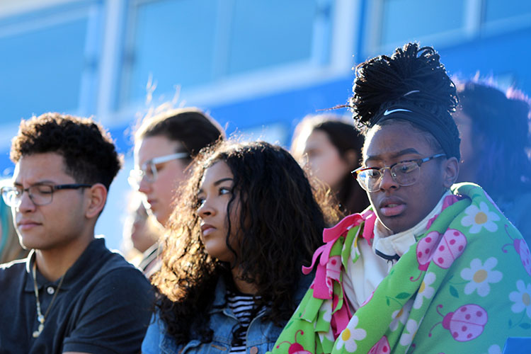 Students watch as during the March For Our Lives event.